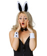 Frightened girl in bunny costume on white background