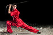 Wushoo man in red practice martial art