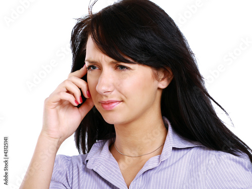 Photo: Portrait of a beautiful brunette with migraine Portrait of a beautiful brunette with migraine