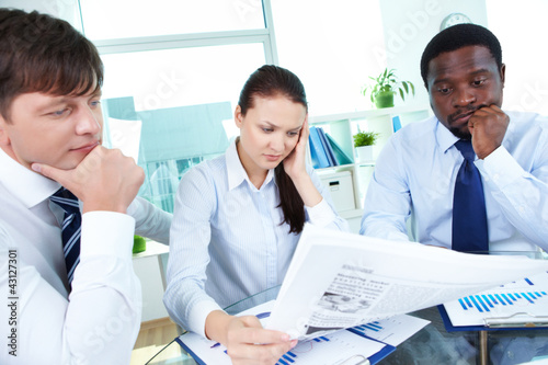 Photo: Getting aware of business news Getting aware of business news