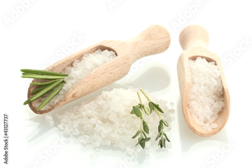 Photo: salt with fresh rosemary and thyme isolated on white salt with fresh rosemary and thyme isolated on white
