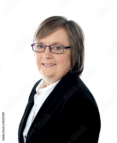 Photo: Corporate woman posing in front of camera Corporate woman posing in front of camera