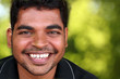 Photo of happy lively handsome middle-aged Indian/asian youth la