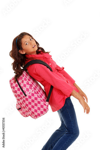 Photo: young school girl with heavy Backpack young school girl with heavy Backpack