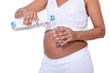 Pregnant Woman filling glass of water
