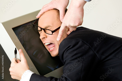 Photo: Businessman being mobbed Businessman being mobbed