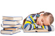 Foto: schoolgirl sleeping over the book on isolated white schoolgirl sleeping over the book on isolated white