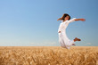 Girl on wheat field