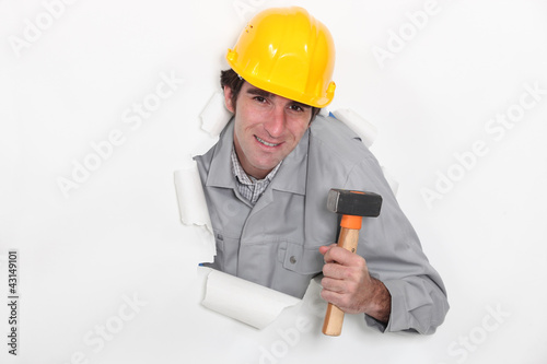 Photo: Construction worker with a mallet Construction worker with a mallet
