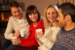 Photo: Group Of Middle Aged Couples Sitting On Sofa With Hot Drinks Tal Group Of Middle Aged Couples Sitting On Sofa With Hot Drinks Tal