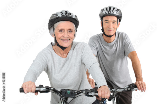 Photo: Elderly couple cycling Elderly couple cycling