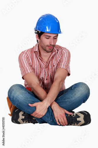 Photo: Tired looking construction worker Tired looking construction worker