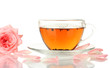 cup of tea with rose isolated on white