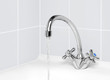 water tap from which the water pours