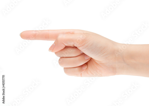 Photo: Pointing hand. Gesture of the hand on white background Pointing hand. Gesture of the hand on white background