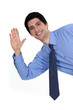 A businessman waving.