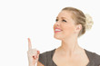Photo: Woman pointing and looking something up Woman pointing and looking something up