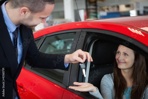 Photo: Customer receiving car keys Customer receiving car keys