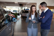 Woman explaining something to a man