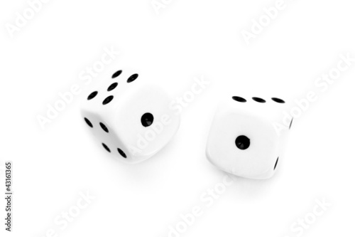 Foto: Two black and white dices thrown Two black and white dices thrown