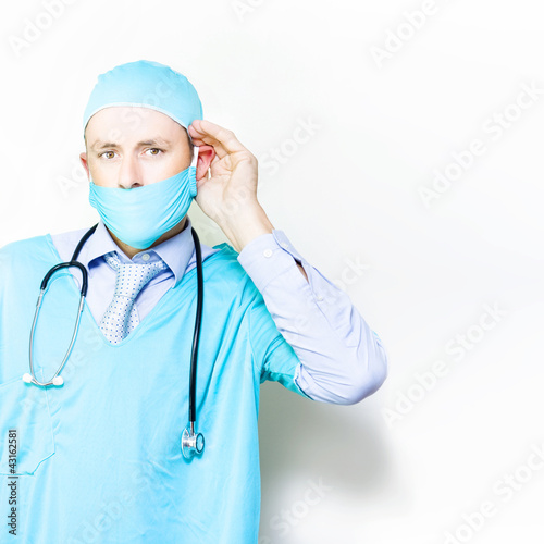 Photo: Audiologist testing for paracusis Audiologist testing for paracusis