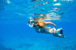 Woman Snorkeling in Tropical Ocean