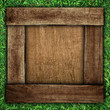 wooden board on grass