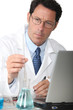 Lab technician analyzing test results