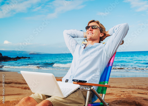 Photo: Business man on the beach Business man on the beach