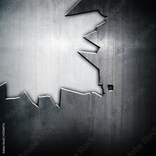 Photo: cracked metal plate cracked metal plate
