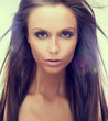 Photo: Portrait of woman with large brown eyes Portrait of woman with large brown eyes