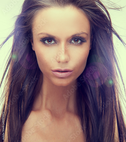Photo: Portrait of woman with large brown eyes Portrait of woman with large brown eyes