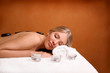 Portrait of young beautiful woman in spa environment.