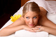 Photo: Portrait of young beautiful woman in spa environment. Portrait of young beautiful woman in spa environment.