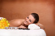 Photo: Portrait of young beautiful woman in spa environment Portrait of young beautiful woman in spa environment