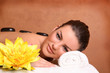 Photo: Portrait of young beautiful woman in spa environment. Portrait of young beautiful woman in spa environment.