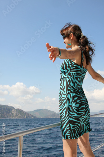 Photo: Happy young woman on holidays Happy young woman on holidays