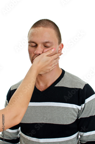 Photo: Woman hand slapping man's face. Isolated on white. Woman hand slapping man's face. Isolated on white.