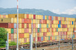 Photo: Stacks of containers at the loading port Stacks of containers at the loading port