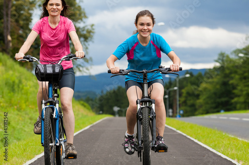 Photo: Girls riding bikes Girls riding bikes