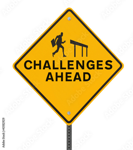 Photo: Challenges Ahead Sign on White Challenges Ahead Sign on White