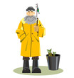 Fisherman in a yellow cloak with a bucket and fishing-rod.