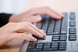 Foto: Hands typing on the keyboard Hands typing on the keyboard