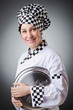 Woman cook isolated on the white