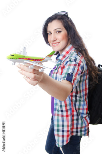 Foto: Girl preparing to travel for vacation Girl preparing to travel for vacation