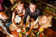 Young people eating in Thai restaurant
