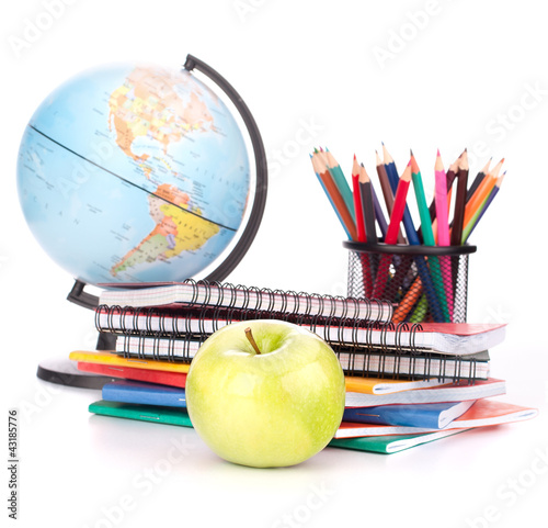 Photo: Globe, notebook stack and pencils. Schoolchild and student studi Globe, notebook stack and pencils. Schoolchild and student studi