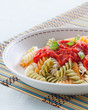 plate of fusilli with tomato sauce
