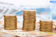 Euro coins on banknote money background