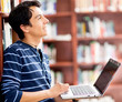 Man researching at the library